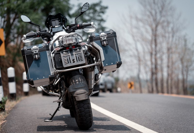 An adventure touring motorcycle parked on a scenic roadside in Las Vegas, NV
