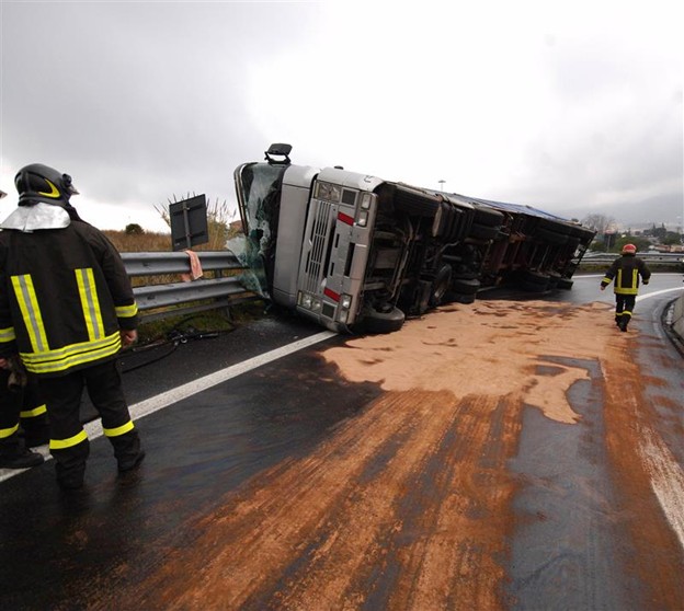 truck slip due to bad road and weather condition